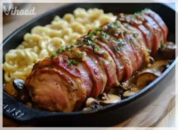 Schweinefilet im Speckmantel mit Champignons und Spätzle