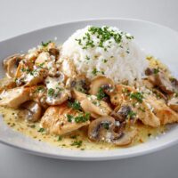Hähnchengeschnetzeltes mit Reis und Pilzen