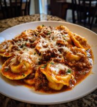 one pot ravioli in a creamy tomato beef sauce